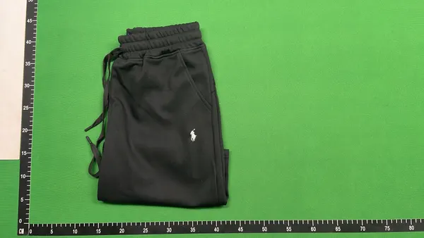 Assorted Embroidered-Emblem Fleece Sweat Shorts — warehouse QC photo 4