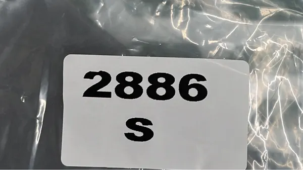 White Crewneck Sweatshirt With Chest Patch — warehouse QC photo 1