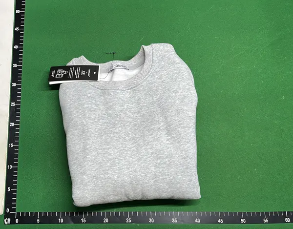 White Crewneck Sweatshirt With Chest Patch — warehouse QC photo 4