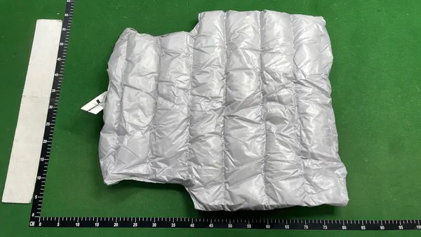 Black Puffer Vest With Flap Cargo Pockets — warehouse QC photo 3