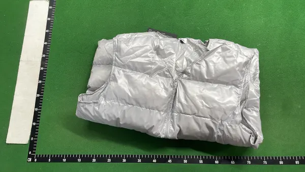 Black Puffer Vest With Flap Cargo Pockets — warehouse QC photo 4
