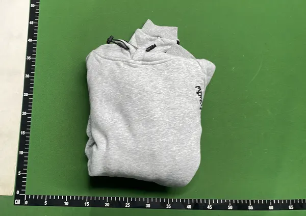 Black Colorblock Pullover Hoodie With Sage Panels — warehouse QC photo 4