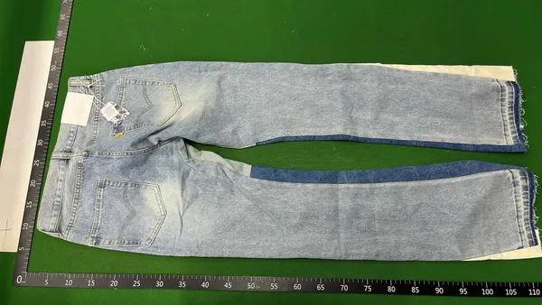 Light Wash Flared Jeans With Contrast Panels — warehouse QC photo 3