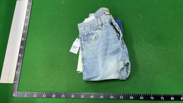 Light Wash Flared Jeans With Contrast Panels — warehouse QC photo 4