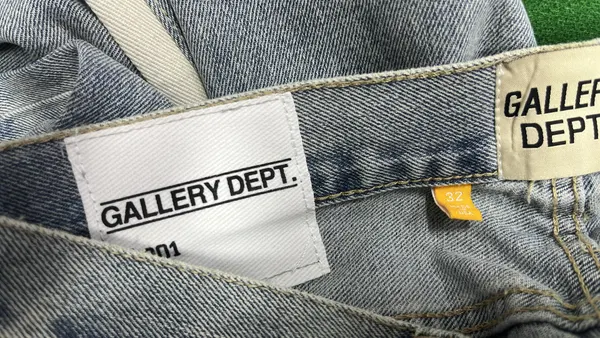 Light Wash Flared Jeans With Contrast Panels — warehouse QC photo 5