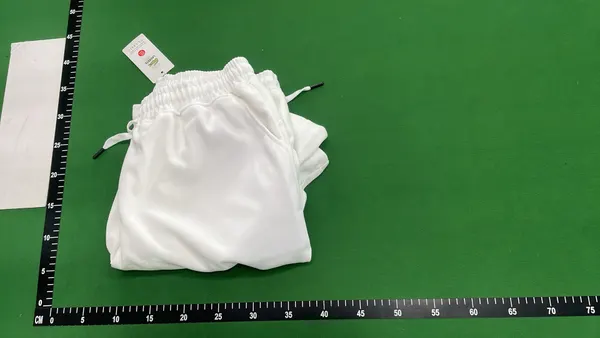 White Drawstring Knit Sweat Shorts — warehouse QC photo 4