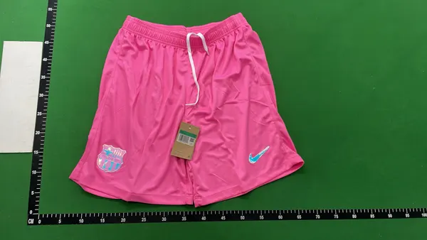 Assorted Athletic Football Shorts With Crests — warehouse QC photo 2