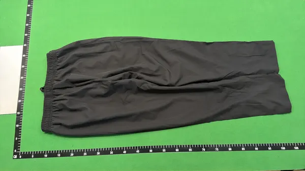 Black Tapered Track Pants With Ankle Zips — warehouse QC photo 3