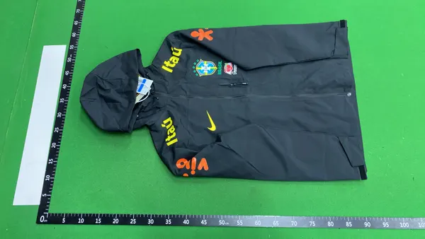 Black Hooded Windbreaker With Embroidered Chest Crest — warehouse QC photo 2