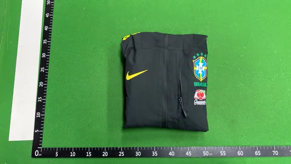 Black Hooded Windbreaker With Embroidered Chest Crest — warehouse QC photo 4