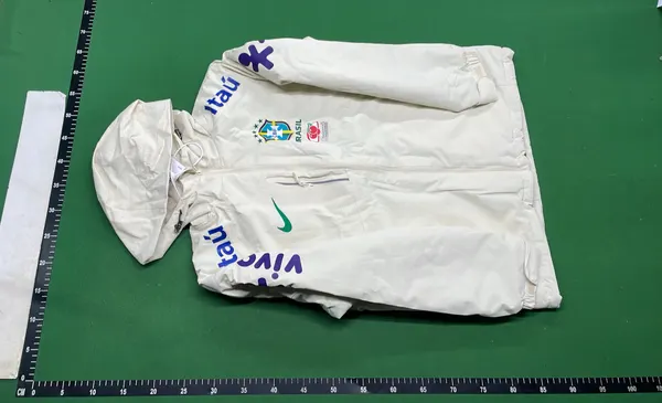 Black Hooded Windbreaker With Embroidered Chest Crest — warehouse QC photo 6