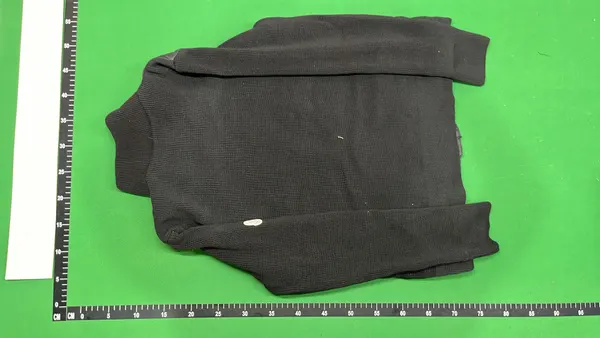 Black Quilted Panel Jacket With Knit Sleeves — warehouse QC photo 3