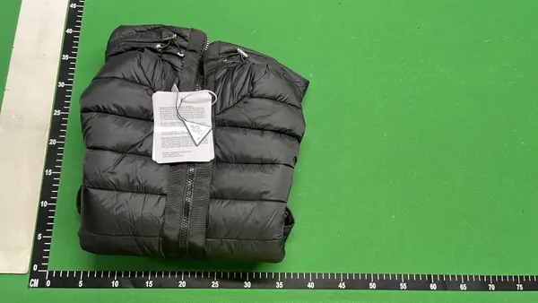 Black Quilted Jacket With Ribbed Knit Sleeves — warehouse QC photo 4