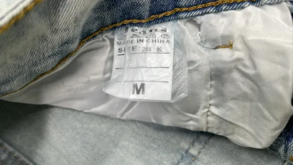 Light Blue Faded Slim Fit Jeans (#2) — warehouse QC photo 1