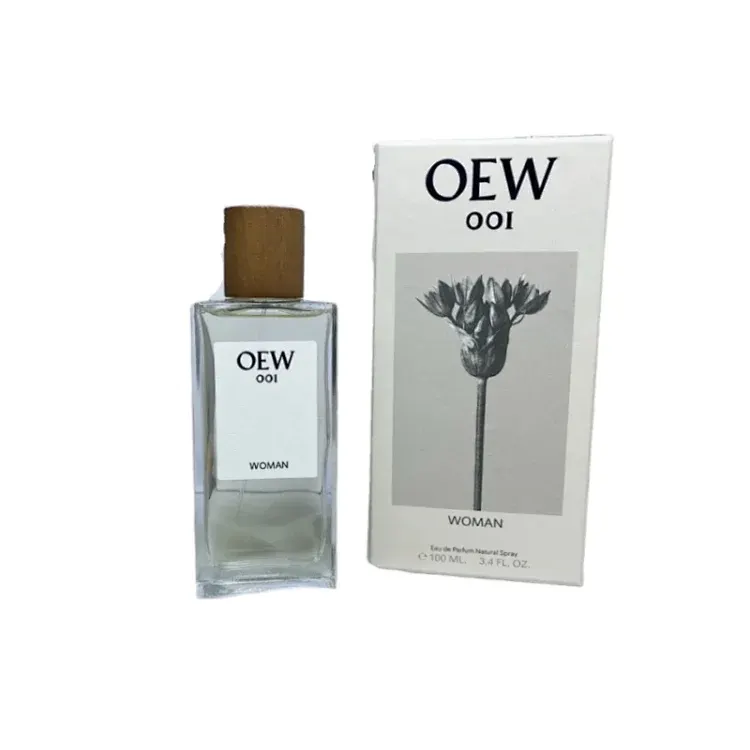 Clear Glass Eau De Parfum With Wooden Cap — merchant catalogue photo