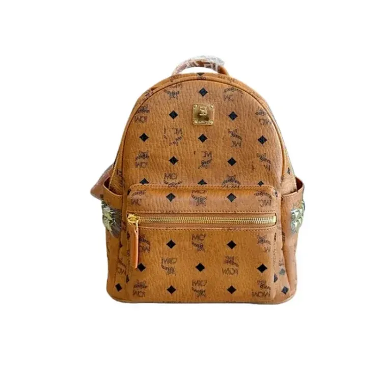 Tan Monogram Print Studded Backpack — merchant catalogue photo