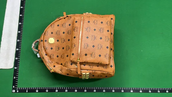 Tan Monogram Print Studded Backpack — warehouse QC photo 1