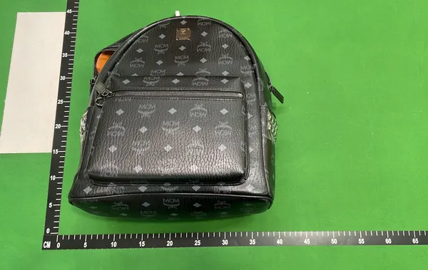 Tan Monogram Print Studded Backpack — warehouse QC photo 4