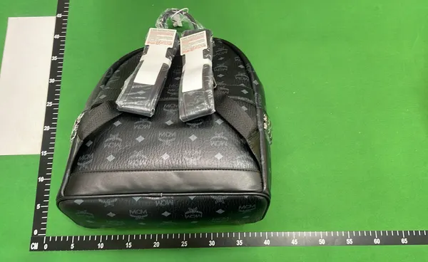 Tan Monogram Print Studded Backpack — warehouse QC photo 5