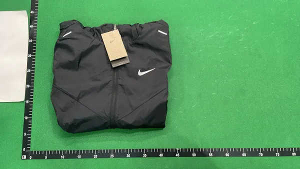 Black Hooded Windbreaker With Reflective Accents — warehouse QC photo 4