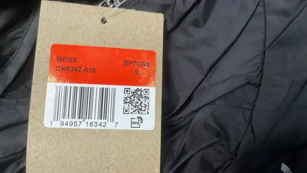 Black Hooded Windbreaker With Reflective Accents — warehouse QC photo 5