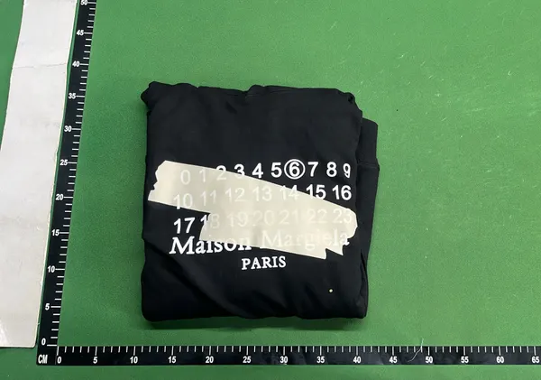 Black Pullover Hoodie With Number Print — warehouse QC photo 4