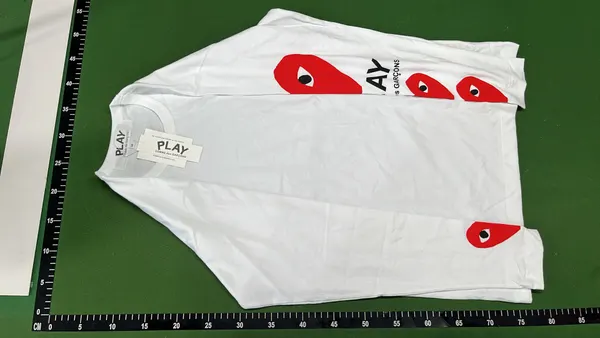 White Long-Sleeve Top With Red Heart Sleeve Print — warehouse QC photo 2