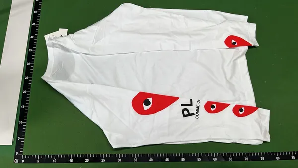 White Long-Sleeve Top With Red Heart Sleeve Print — warehouse QC photo 3