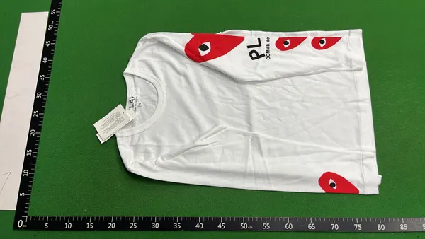 White Long-Sleeve Top With Red Heart Sleeve Print — warehouse QC photo 6