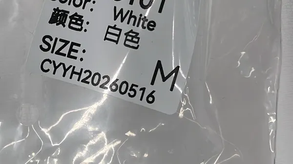 White Oversized Tee With Script Chest Print — warehouse QC photo 1