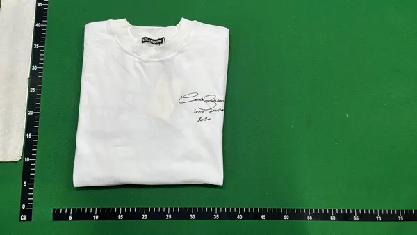 White Oversized Tee With Script Chest Print — warehouse QC photo 4