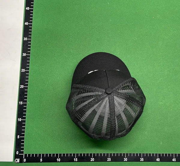 Black Mesh Trucker Cap With Raised Embroidery — warehouse QC photo 2