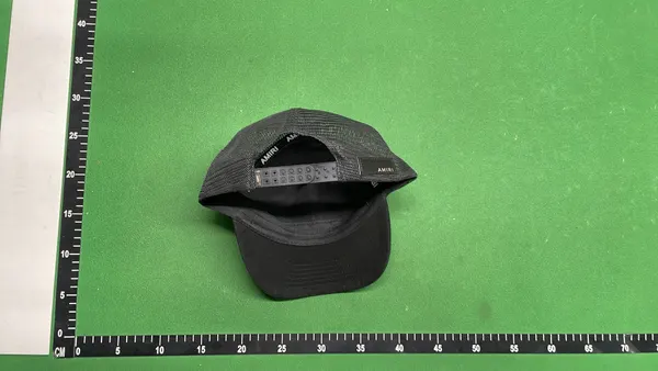 Black Mesh Trucker Cap With Raised Embroidery — warehouse QC photo 3