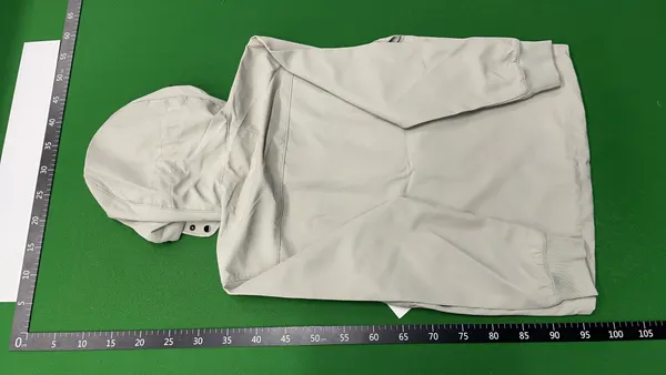 Black Hooded Softshell Jacket With Lens Detail — warehouse QC photo 3