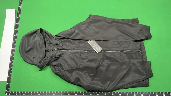 Black Hooded Softshell Jacket With Lens Detail — warehouse QC photo 6