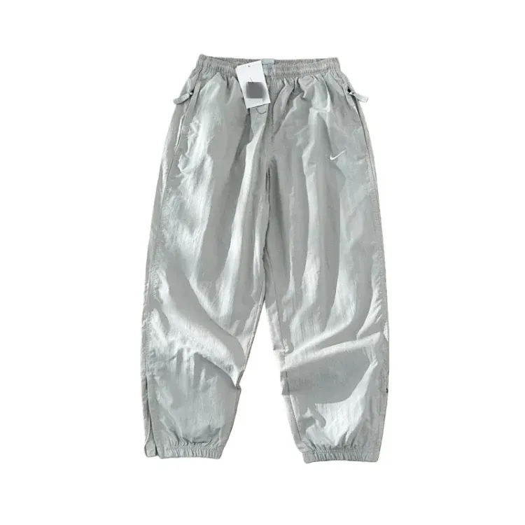 Grey Crinkle Nylon Track Pants With Elastic Cuffs — merchant catalogue photo
