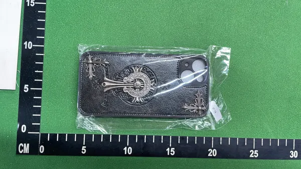 Black Leather-Look Phone Case With Cross Studs — warehouse QC photo 1