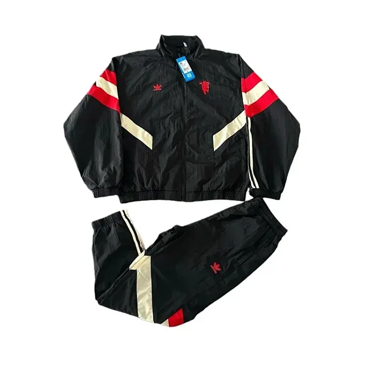 Black Track Jacket Set With Red Chevron Stripes — merchant catalogue photo