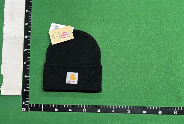 Black Ribbed Knit Cuffed Beanie — warehouse QC photo 1