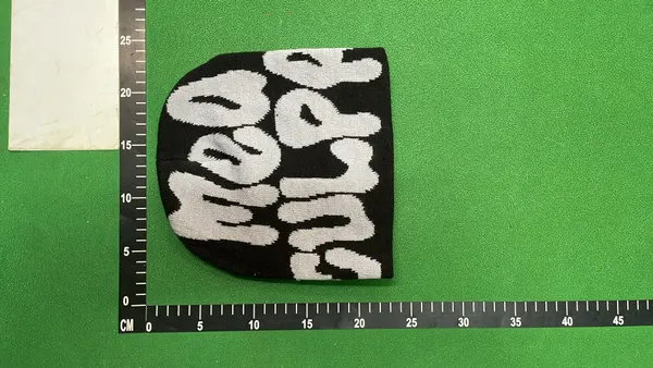 Ribbed Knit Beanie With Jacquard Lettering — warehouse QC photo 3